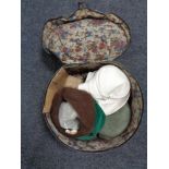 A vintage hat box of lady's hats