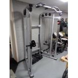 A gym spec cable cross over machine with bar attachments