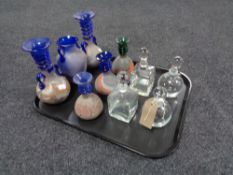 A tray of six decorative studio glass vases,