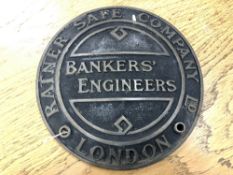 A cast metal circular safe-maker's plate : Bankers' Engineers, 21 cm.