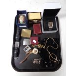 A tray of gent's wristwatches, DKNY, decorative eggs, Penguin lighter,