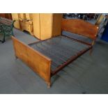 A 1930's walnut 4'6" bed frame with Vono box spring CONDITION REPORT: Width 140 cm,