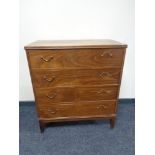 A mid century continental four drawer chest