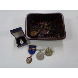 A box of WW II medals,