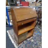 A mid century walnut bureau bookcase