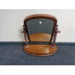 A Victorian mahogany toilet mirror with barley twist columns