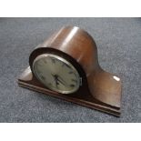 An oak cased 1930's clock with silvered dial