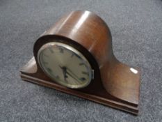 An oak cased 1930's clock with silvered dial