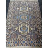 A Caucasian rug on blue ground,