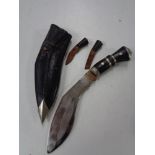 A Kukri knife in scabbard