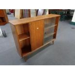 A mid century teak sliding door bookcase CONDITION REPORT: 199 cm x 27.5 cm x 83.