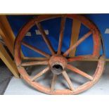 A wooden cart wheel