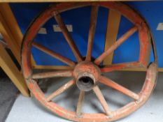 A wooden cart wheel