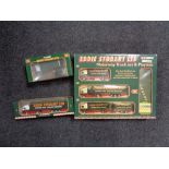 A boxed Corgi Eddie Stobbart limited motorway truck and play set together with two further boxed