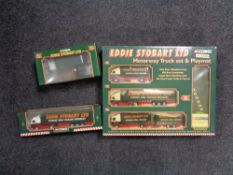 A boxed Corgi Eddie Stobbart limited motorway truck and play set together with two further boxed