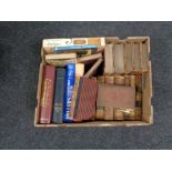 A box of antique and later books, leather bound volumes,