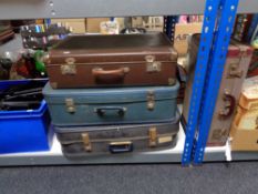 Four mid century luggage cases