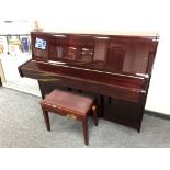 A Kawai overstrung upright piano model K-15E no.