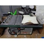 An Nu-tool 10 inch table saw HS10