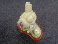 A Border Fine Arts figure - Hen with chicks on wooden plinth