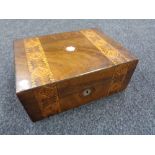 A Victorian inlaid walnut sewing box containing sewing items and thread