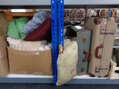 Two vintage luggage cases and a box of assorted cushions and blanket