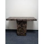 A marble effect hall table