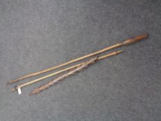 Two tribal spears and a barbed spear head CONDITION REPORT: The longest 136 cm.