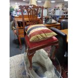 A nineteenth century oak chair together with a cushion