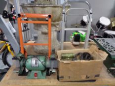 Two folding sack barrows together with a boxed motor and boxed Nu-tool grinder