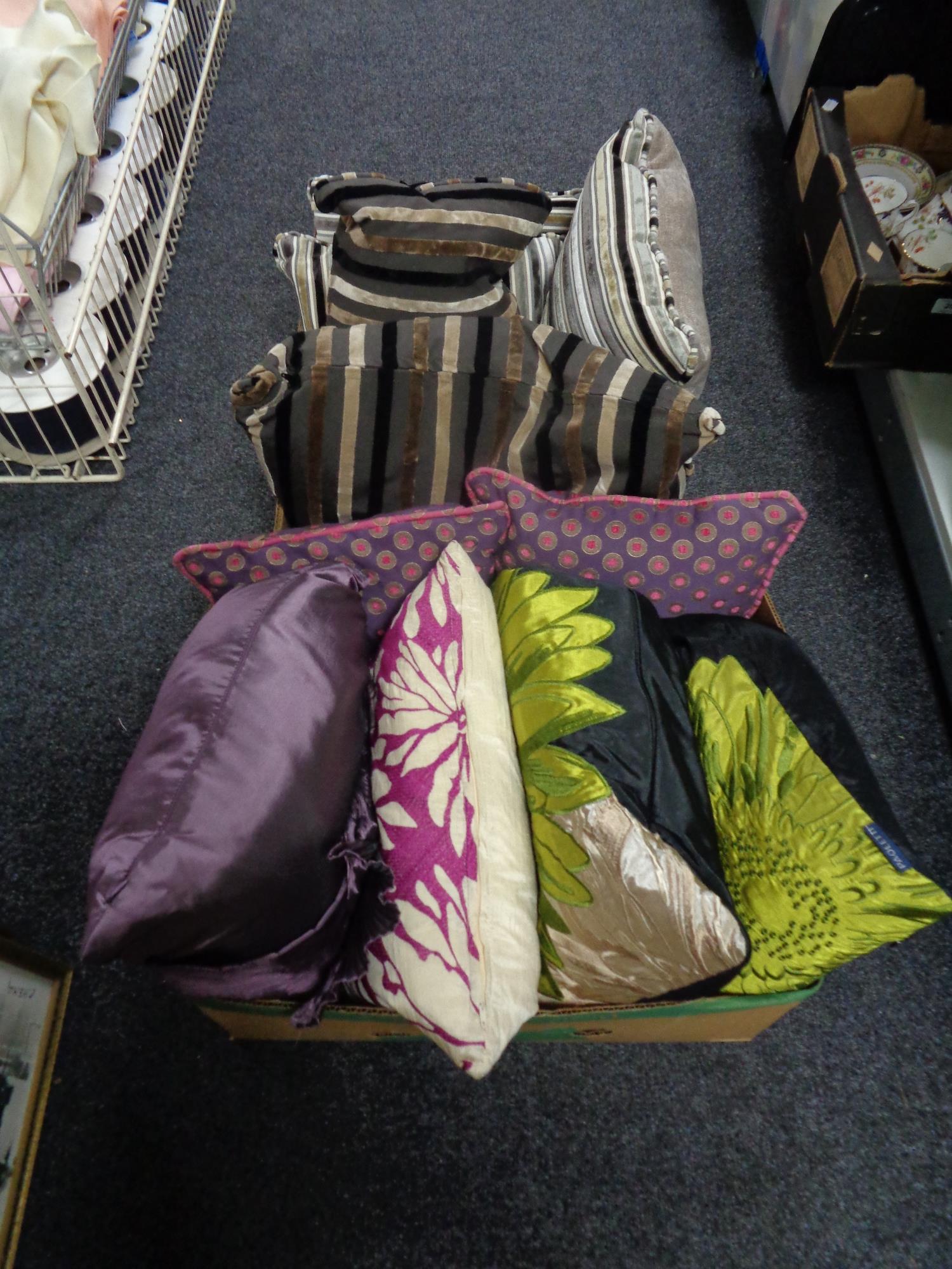 Two boxes of assorted cushions