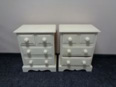 A pair of painted pine four drawer bedside chests