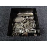 A box of silver plated cutlery, coins, two silver brush backs,