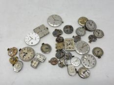 A quantity of vintage watch movements, including Rolex Super Balance, Tudor, Longines, IWC,