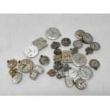 A quantity of vintage watch movements, including Rolex Super Balance, Tudor, Longines, IWC,