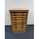 A continental oak shutter fronted music cabinet 65 cm x 48 cm x 102 cm (h) CONDITION