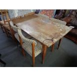 A mid century teak extending dining table and four chairs 131 cm x 86 cm