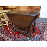 A twentieth century oak gateleg table