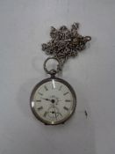 A silver fob watch on chain