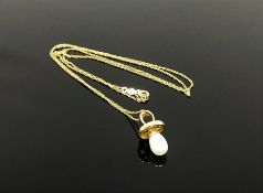 A 10ct gold pearl pendant on chain