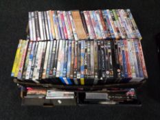 Four boxes of assorted DVD's