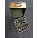 A vintage Hermes 2000 typewriter in case