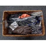 A wicker basket of Gent's gloves and ties,
