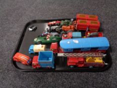 A tray of mid century and later playworn diecast and plastic vehicles,