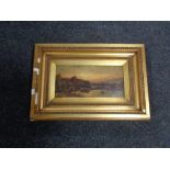 An antique gilt framed oil on board- rowing boat on lake with castle beyond signed Mctear