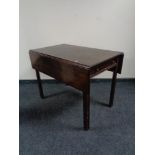 An early 19th century mahogany Pembroke table