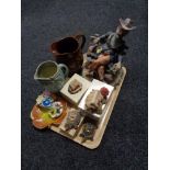 A tray of Italian figure of a tramp, musical pottery jug,