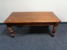 An Eastern mahogany coffee table