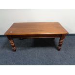 An Eastern mahogany coffee table