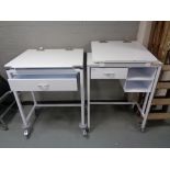 Two metal medical trolleys fitted with drawers